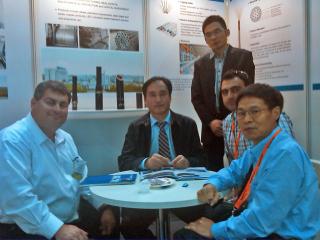 George Sfeir; Xingjun Shang, CEO of Baoshida; Interpreter of Baoshida; Joseph Jacoub; Frank Wang